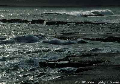stormy seas and rock shelf