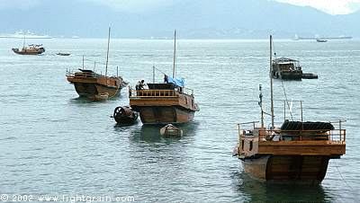 junks in Hong Kong harbor